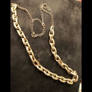 Plastic long necklace in gold